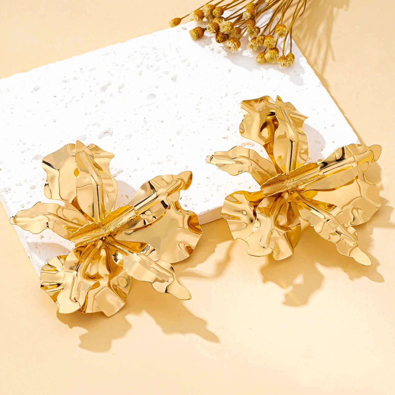 Boucles d’oreilles motif végétal